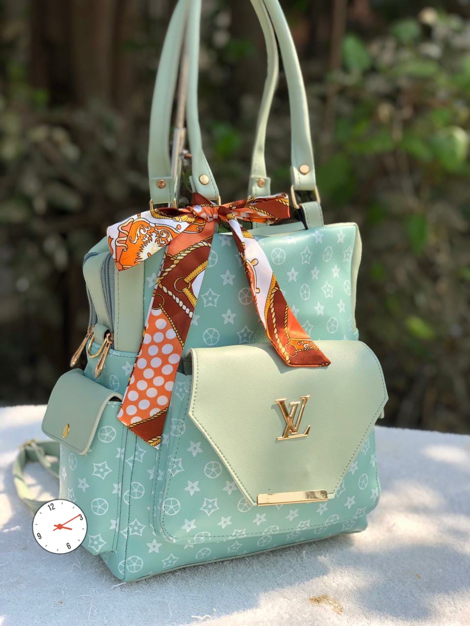 VersaLux: LV Switchable Backpack to Handbag